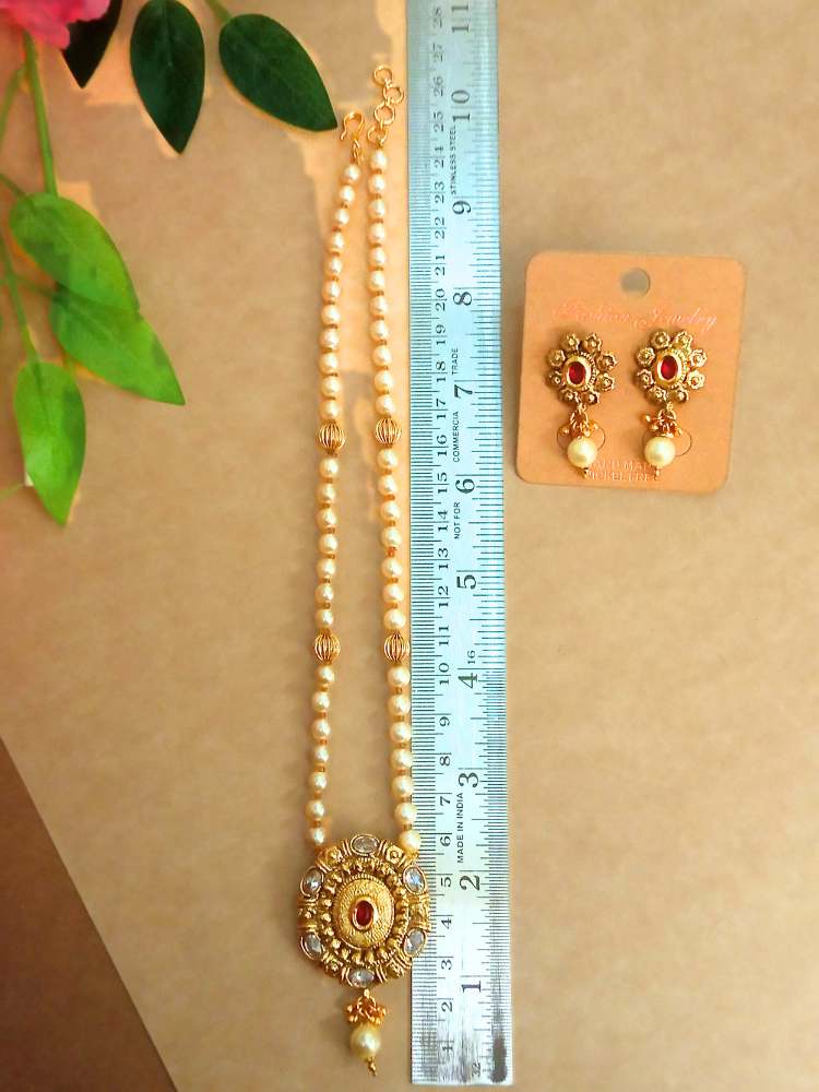 GARIMAA IVORY-RUBY JEWELLERY SET