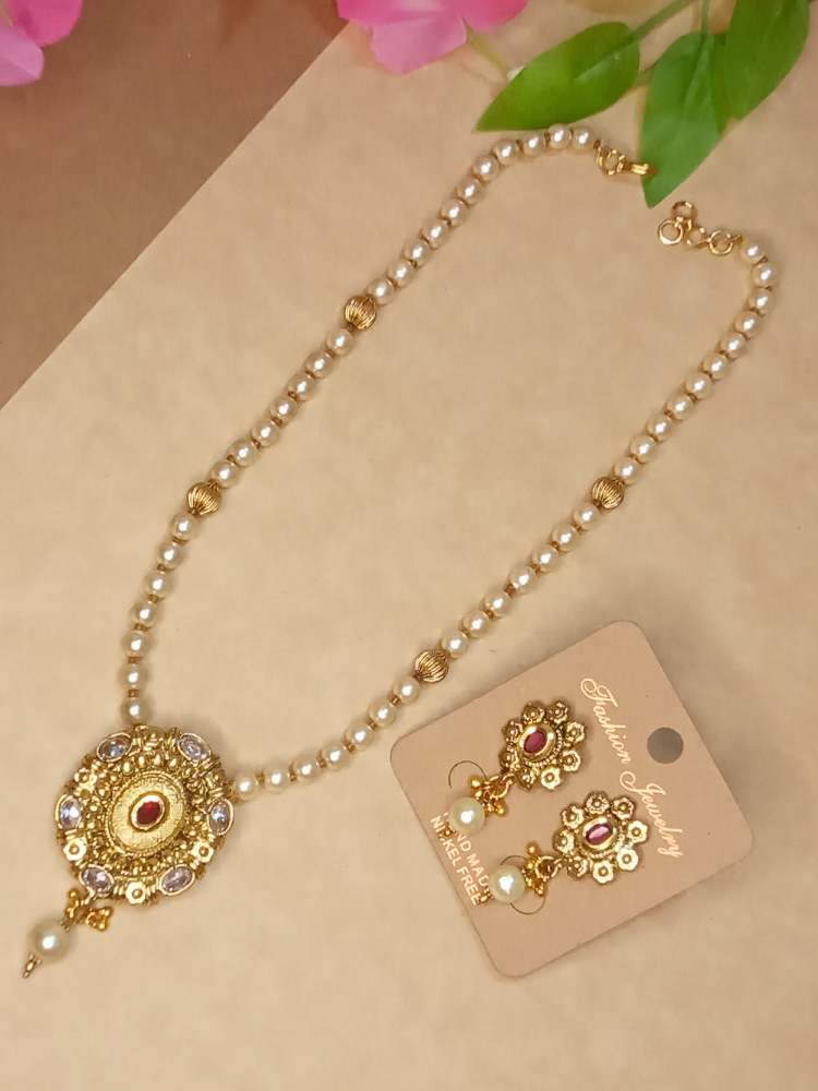 GARIMAA IVORY-RUBY JEWELLERY SET